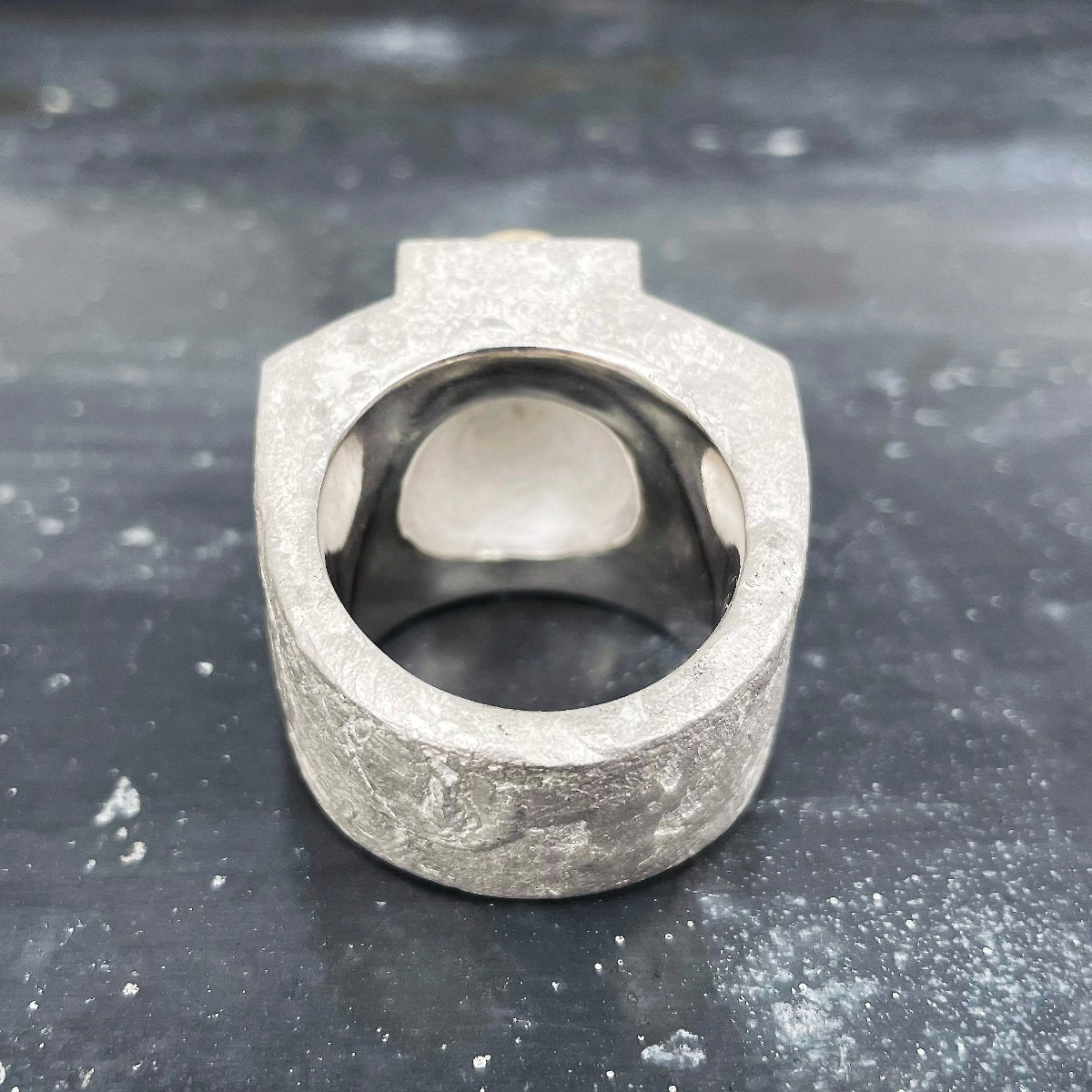 Silver ring with aquamarine in gold setting back side