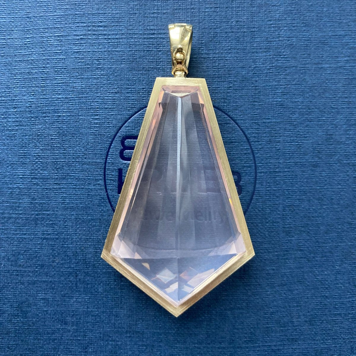Rose quartz amulet back side