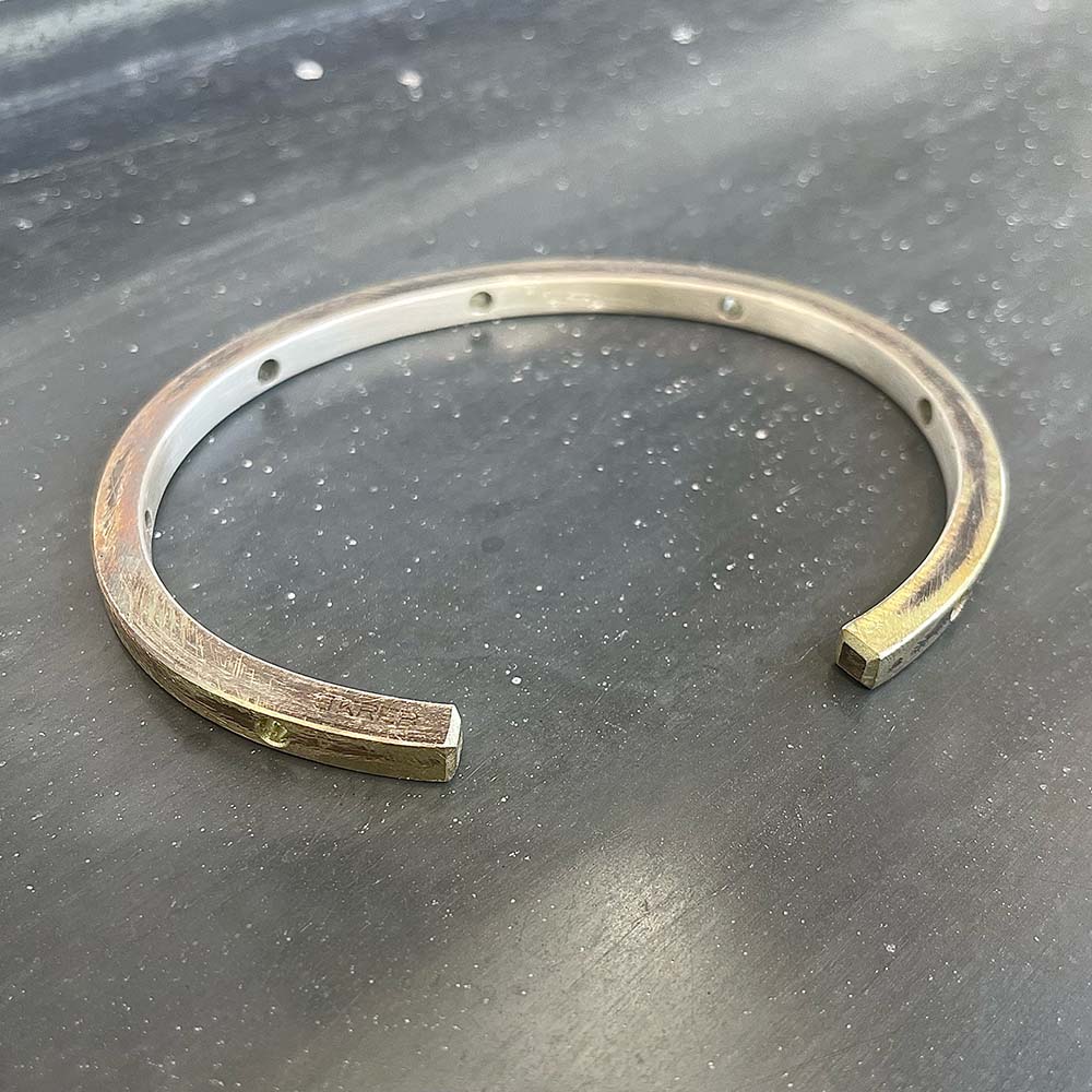 SQH bangle raw with holes back side
