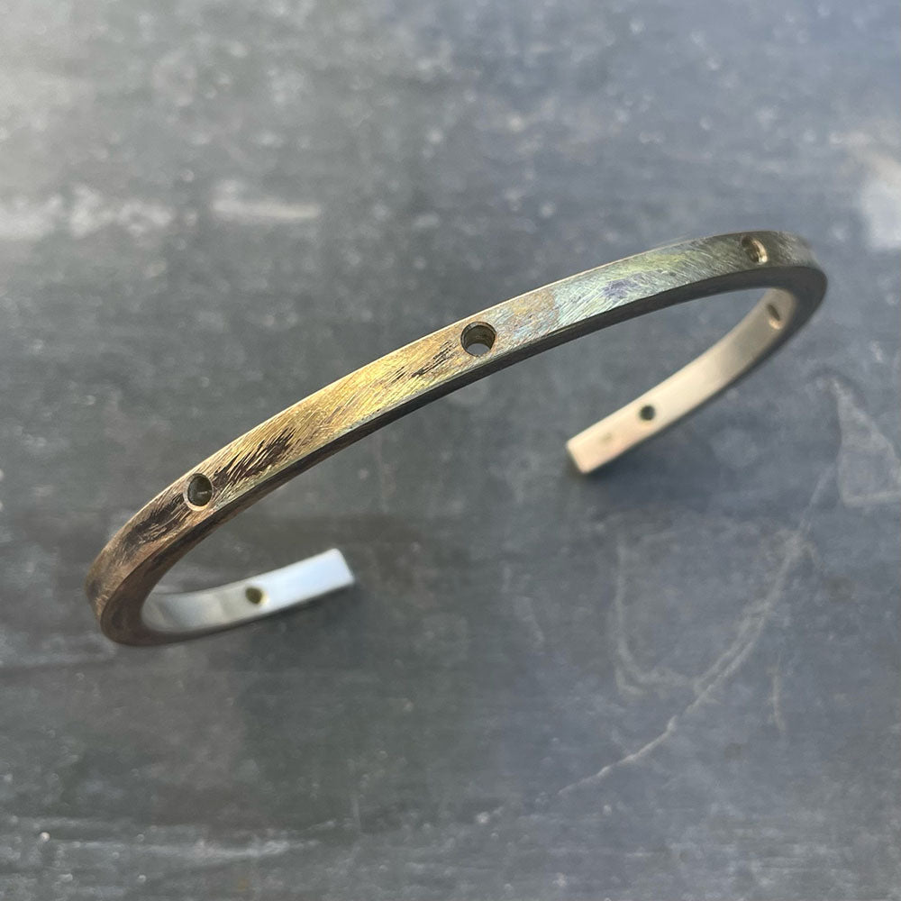 SQH bangle raw with holes top