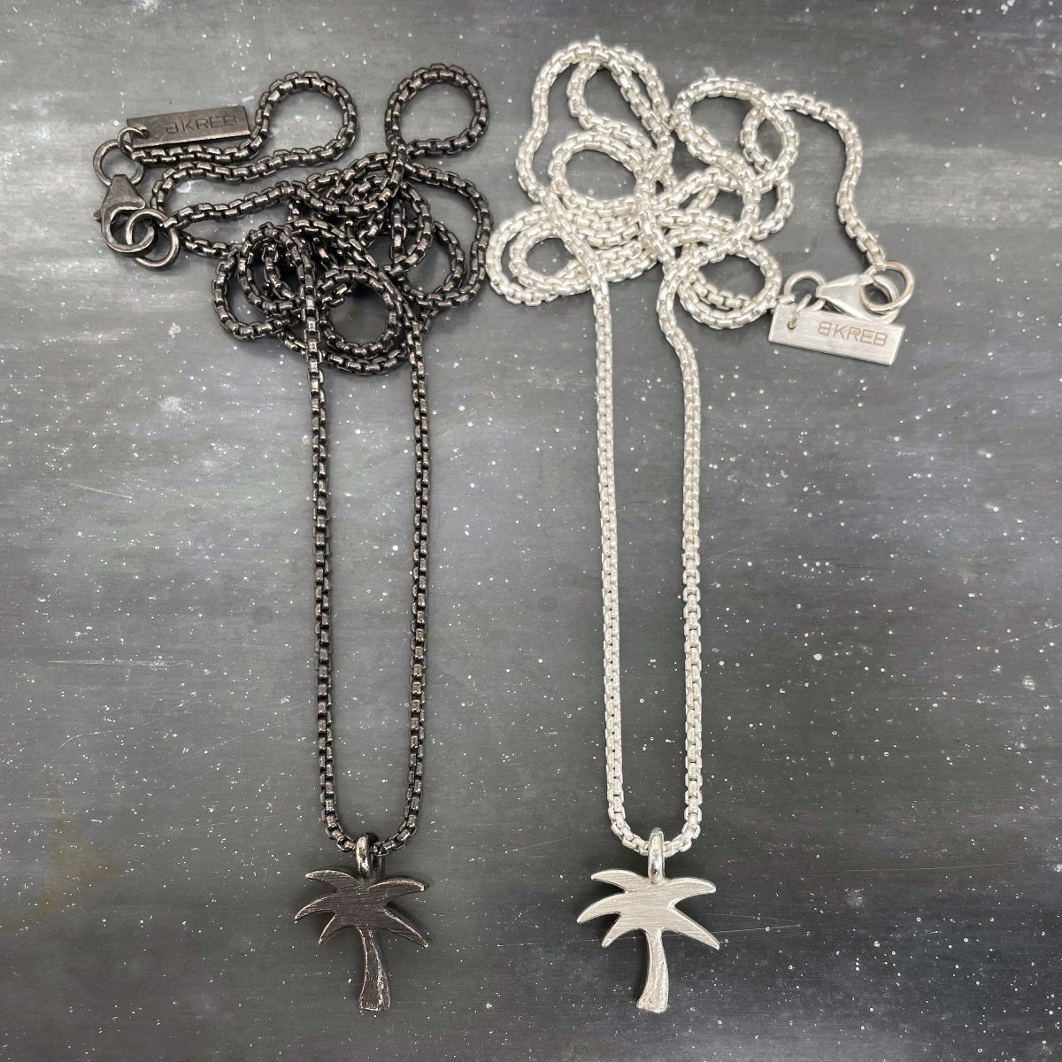 Palm necklaces black and silver