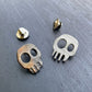 Skull pins in silver and raw