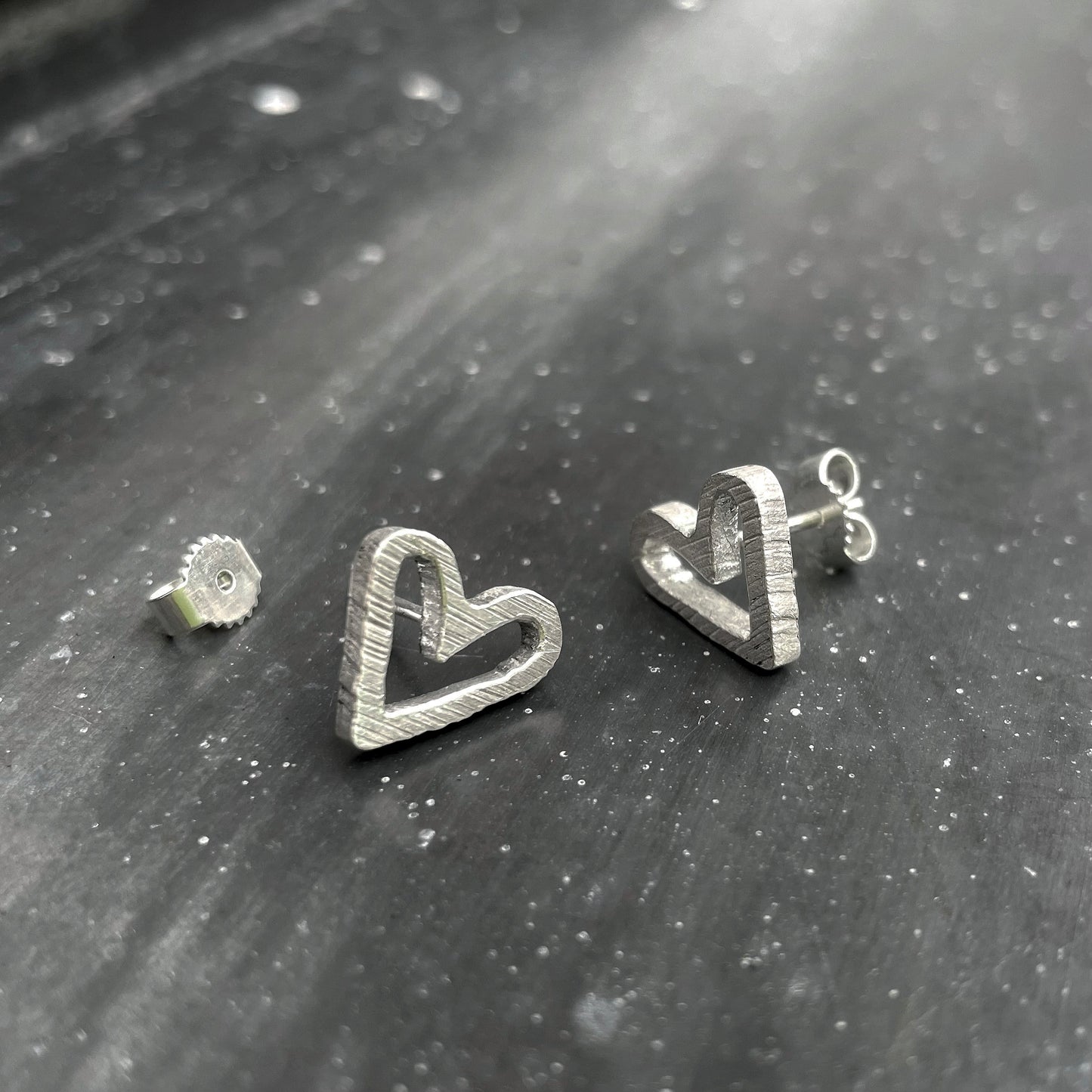 Heart ear studs in sterling silver