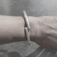 B1 bangle silver with surface structure front side worn I shop.bkreb.com
